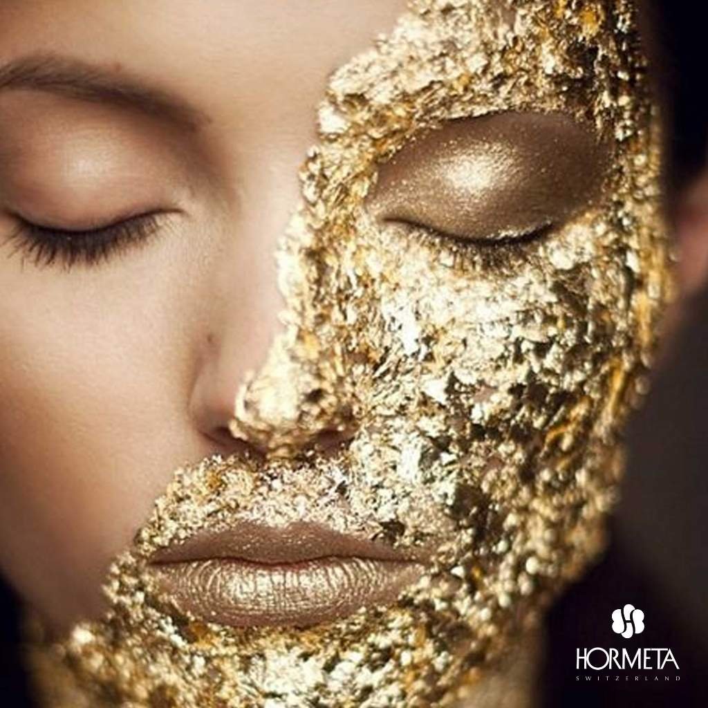 a gold mask of Hormeta Products