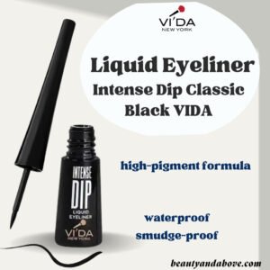 A product shot of the VIDA NY Liquid Eyeliner Intense Dip bottle. The label indicates a classic black, intense color.