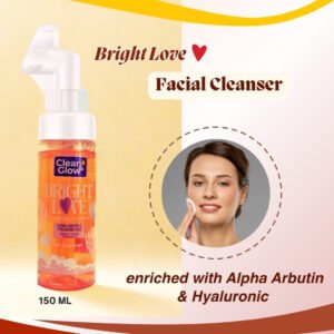 A bottle of Clean and Glow Bright Love Foaming Facial Cleanser enriched with Alpha Arbutin and Hyaluronic Acid, next to a model's face, to illustrate the product's key ingredients and benefits.